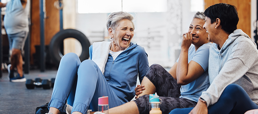 group of woman at the gym laughing